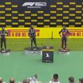 There's an R/C car underneath F1's trophy delivery robot image