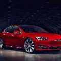 Report: Apple to buy out Tesla in making self-driving cars? image