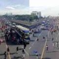 Standing room only: Commonwealth Ave. commuters take to the streets, literally image