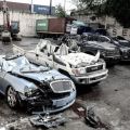 Ten smuggled cars meet crushing end at Port of Manila, Cebu image