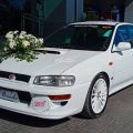 You can rent this Subaru Impreza STI as your wedding car image