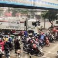 MMDA to fine riders blocking traffic while sheltering from rain image