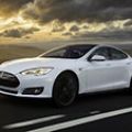Tesla launches battery swap pilot program image