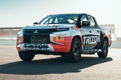 Yes, that's a Mitsubishi Strada race truck image