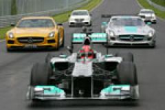 Michael Schumacher drives the Silver Arrow around the Nurburgring image