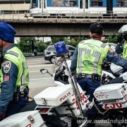 Motorcycle-riding PNP-HPG officers conduct random vehicle inspections image