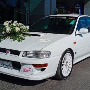 You can rent this Subaru Impreza STI as your wedding car image