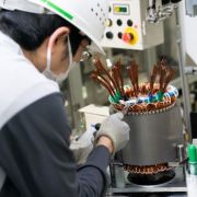 Nissan working to make EVs cheaper image