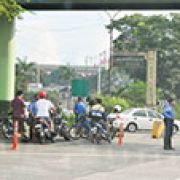 Aquino signs law banning small children riding on motorbikes in public image