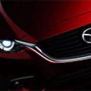 Mazda says gas, diesel engines comply with emission standards image