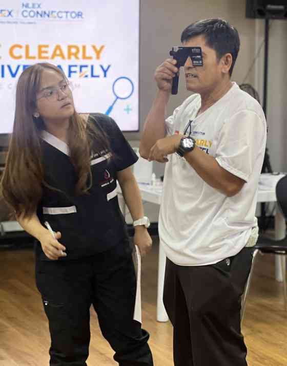 NLEX Corporation gives bus drivers free glasses, eyecare service image