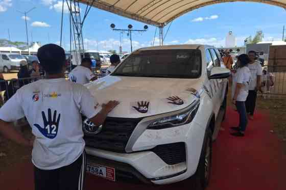 College student wins Toyota Fortuner in Lipa version of Palm Challenge image