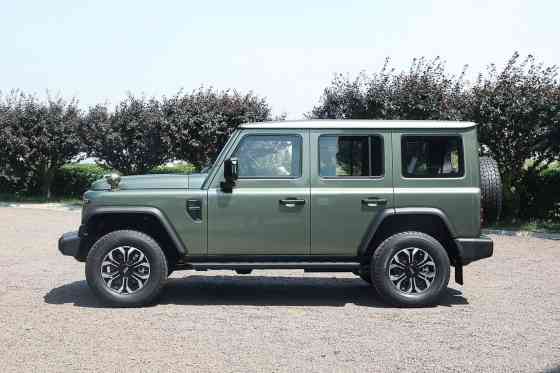 This 4x4 is a mix of a Land Cruiser, Wrangler, and Defender image
