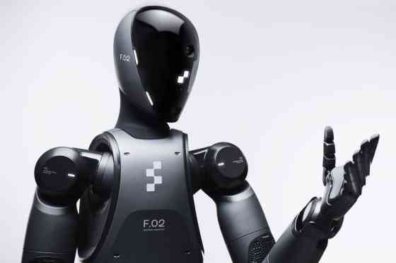 BMW testing intelligent humanoid robot factory workers image