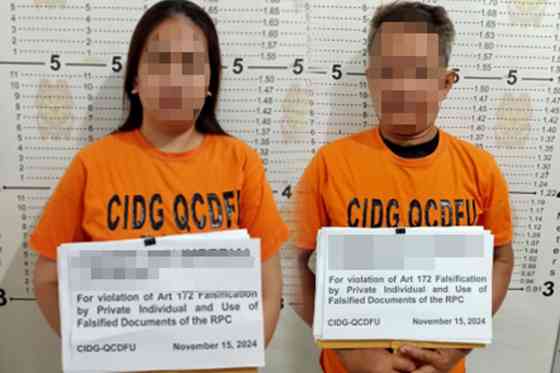 LTO, law enforcers nab fixers next door to LTO HQ image