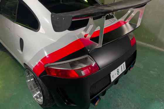 Tuner transforms Daihatsu Copen into a mini Porsche 911 image