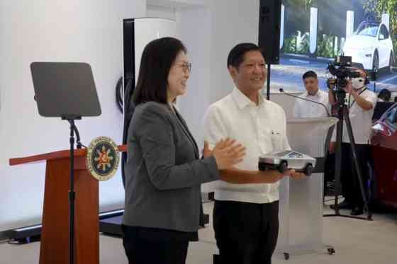 PBBM visits the Tesla storefront in BGC image