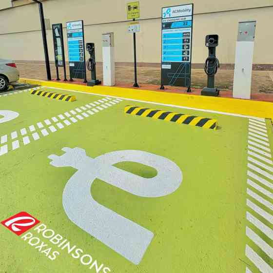 ACMobility, Robinsons Malls partner up to expand EV charging in PH image