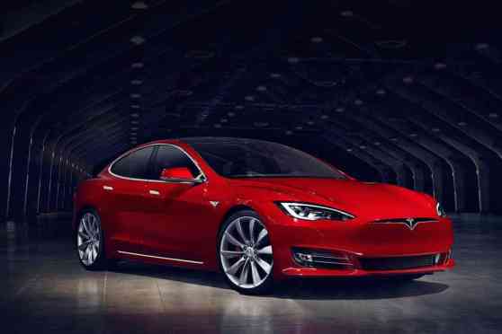 Report: Apple to buy out Tesla in making self-driving cars? image