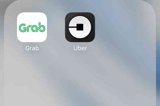Grab, Uber fined Php 5M each by LTFRB for undocumented operators image