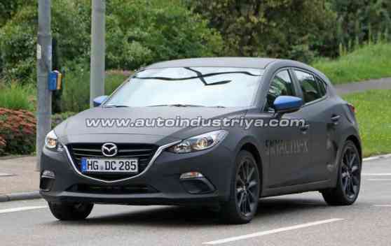Spied: Next-gen Mazda 3 mule testing Skyactiv-X engine image