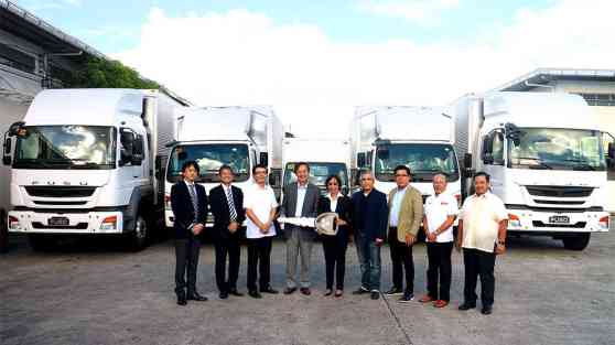 Mitsubishi turns over fleet of FUSO trucks to MetroPac Movers logistics image