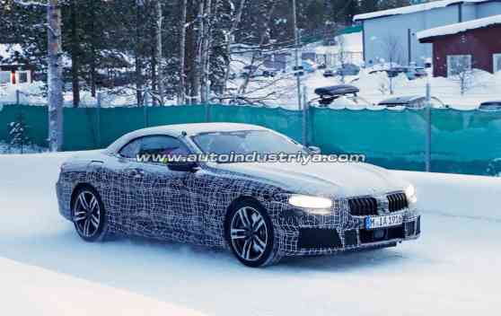 Spied: BMW takes top off the 8 Series image