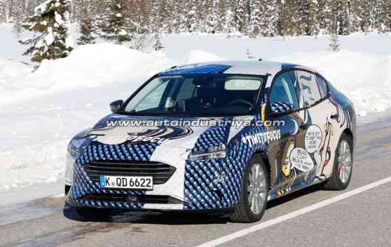 Spied: Ford suits up next-gen Focus Sedan in comic-inspired livery image