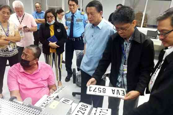Transport officials inspect new local license plate manufacturing facility image