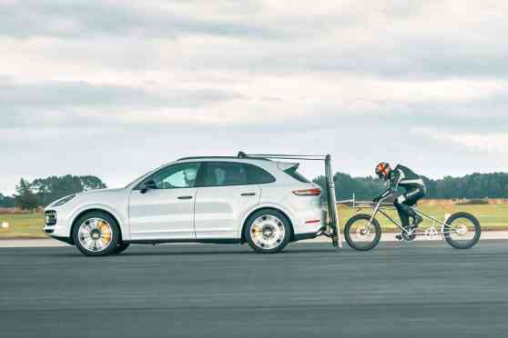 Break a bicycle land speed record with the help of Porsche image
