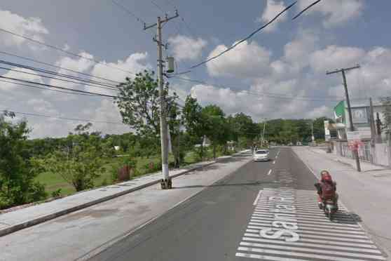Pole position: Why are there utility posts blocking newly widened roads? image