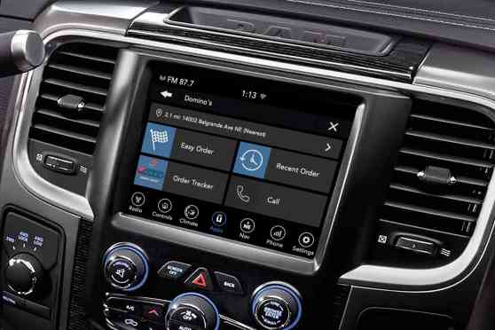 Order food, gas up or make reservations with FCA's Uconnect Market image