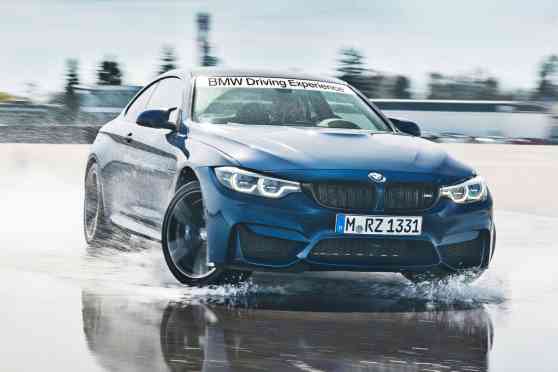 BMW takes on the #BottleCapChallenge by drifting an M4 image