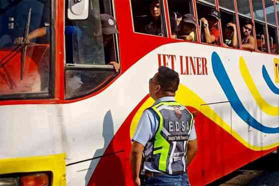 MMDA's Nebrija enforces EDSA bus lanes, gets yelled at by passengers image