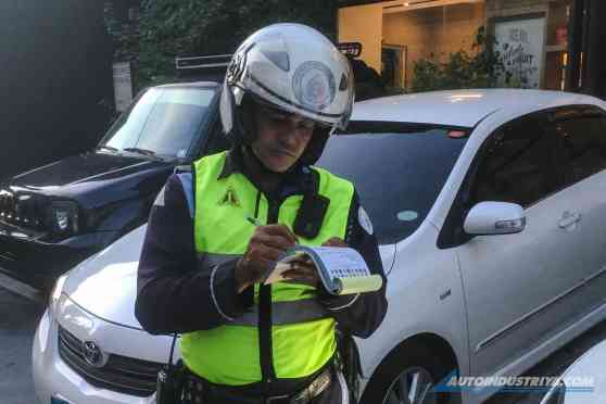 Quezon City cracks down on street parking image