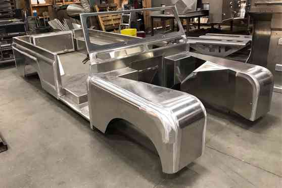 This shop is building classic Land Rover Defenders from aluminum image
