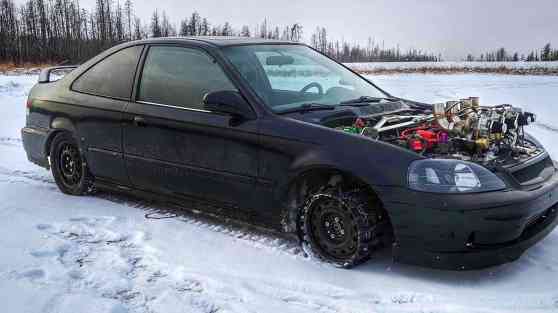 Quad-turbo, tank-tracked Honda Civic is a snowmobile on steroids image