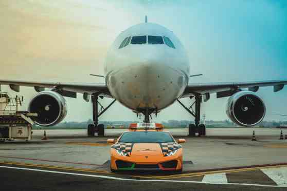 This Lamborghini Huracan guides airplanes in Italy for a living image