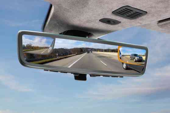 Aston Martin's new rear view mirror can display three screens image