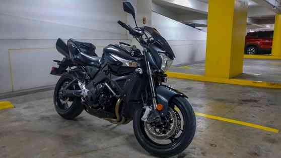 Here's why you'll start seeing motorcycles in mall car parking slots image