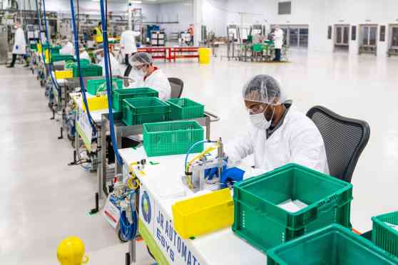 GM sharing face mask production plans with parts suppliers image