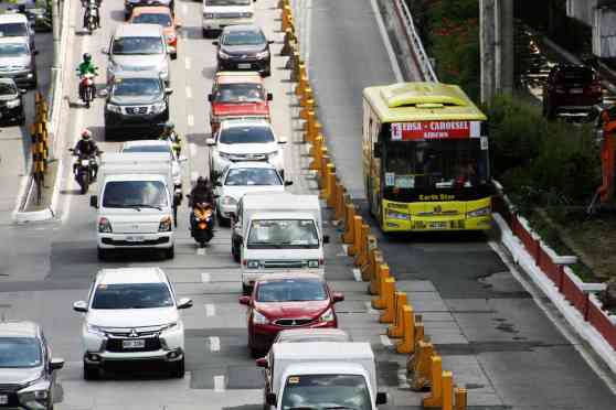 MMDA wants to move EDSA bus doors to the left side image