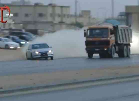 Saudis drifting with executive cars and assault rifles image