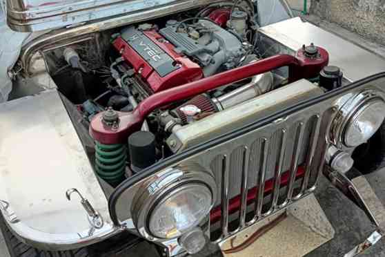 Stainless Sleeper: Owner jeep with Honda S2000 engine for sale image