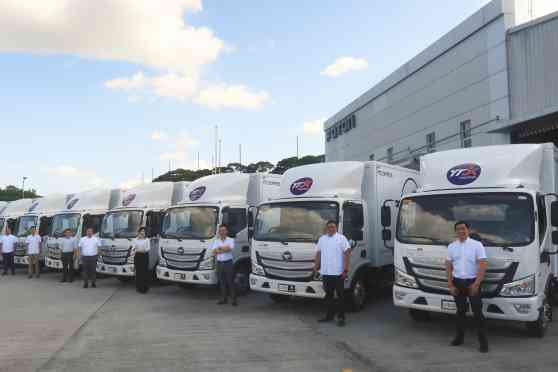 Foton turns over 300 trucks to YTO Express Philippines image