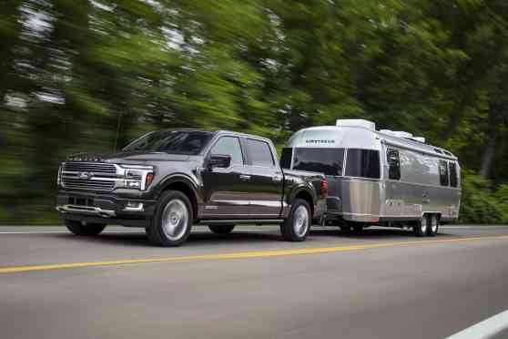 New F-150 is the first Ford to offer a swinging tailgate image