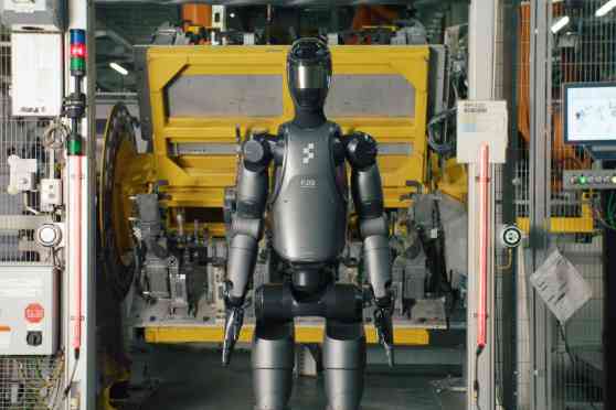 BMW testing intelligent humanoid robot factory workers image