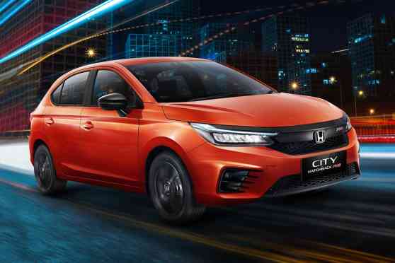 We want the Honda City Hatchback RS in Phoenix Orange Pearl image