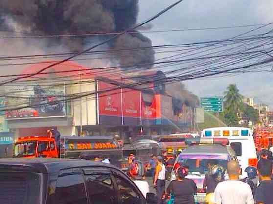 Devastating fire consumes Concept One showroom image