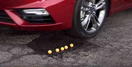 New tech from Ford allows cars to 'glide' over potholes image